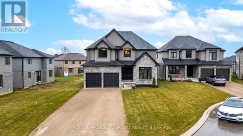 130 Birdie Court, Woodstock, ON - Outdoor With Facade