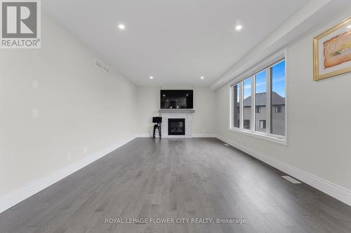 130 Birdie Court, Woodstock, ON - Indoor With Fireplace