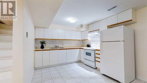 Bsmt - 5 Feeney Avenue, Toronto, ON - Indoor Photo Showing Kitchen With Double Sink