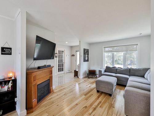 Living room - 529 Rue Arthur-Foucher, Repentigny (Le Gardeur), QC - Indoor Photo Showing Living Room With Fireplace