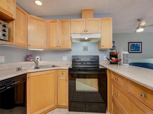 102-2844 Bryn Maur Rd, Langford, BC - Indoor Photo Showing Kitchen With Double Sink