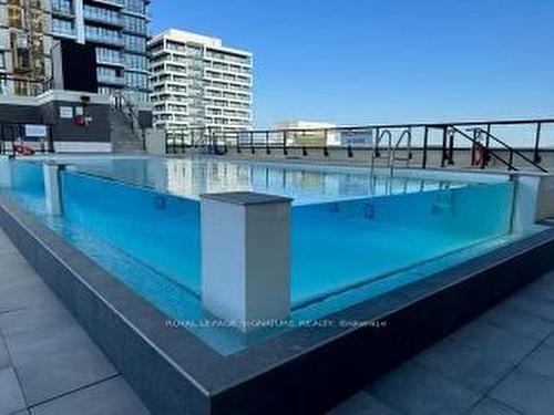 1709-15 Water Walk Dr, Markham, ON - Outdoor With In Ground Pool