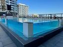 1709-15 Water Walk Dr, Markham, ON  - Outdoor With In Ground Pool 