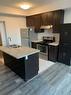 312-2490 Old Bronte Rd W, Oakville, ON  - Indoor Photo Showing Kitchen With Double Sink 