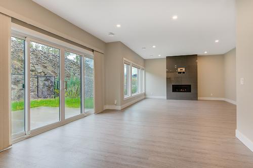 788 Acadia Street, Kelowna, BC - Indoor Photo Showing Other Room With Fireplace