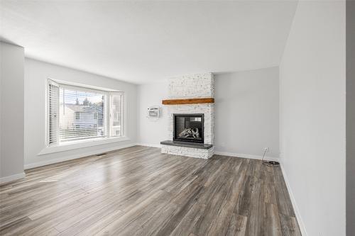 278 Temple Court, Kelowna, BC - Indoor Photo Showing Living Room With Fireplace