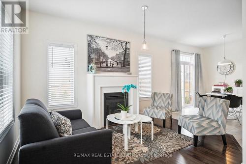 8 Falvo Street, Wasaga Beach, ON - Indoor Photo Showing Living Room With Fireplace