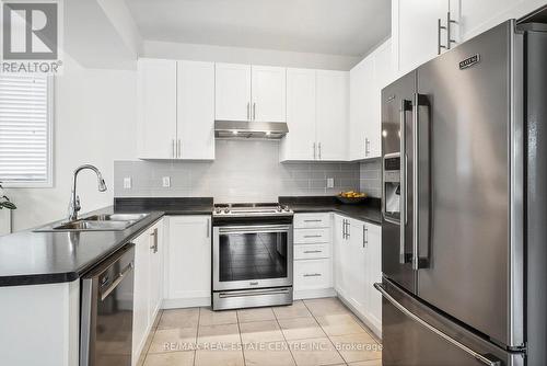 8 Falvo Street, Wasaga Beach, ON - Indoor Photo Showing Kitchen With Double Sink With Upgraded Kitchen