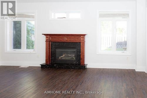 99 Wolf Trail Crescent, Richmond Hill, ON - Indoor Photo Showing Living Room With Fireplace