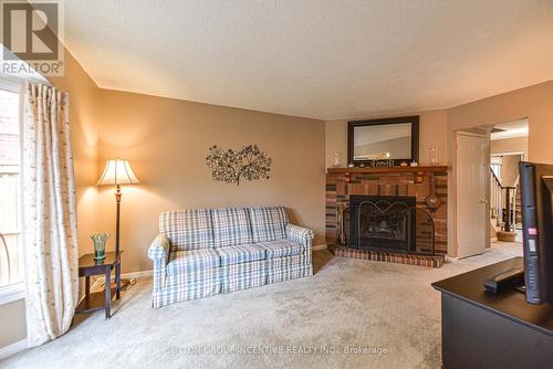 50 - 165 Kozlov Street, Barrie, ON - Indoor Photo Showing Living Room With Fireplace