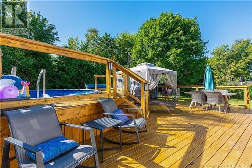 8 Wedgewood, Rothesay, NB - Outdoor With Above Ground Pool With Deck Patio Veranda With Exterior