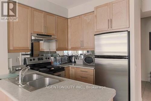 406 - 1121 Bay Street, Toronto, ON - Indoor Photo Showing Kitchen With Stainless Steel Kitchen With Double Sink