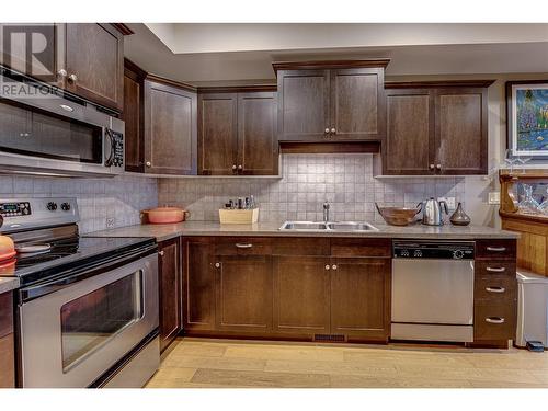 4900 Heritage Drive Unit# 201, Vernon, BC - Indoor Photo Showing Kitchen With Stainless Steel Kitchen With Double Sink