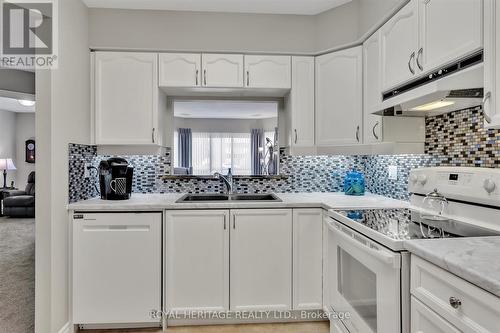 106 - 3 Heritage Way, Kawartha Lakes (Lindsay), ON - Indoor Photo Showing Kitchen With Double Sink