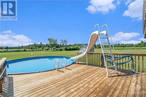 2393 Tennyson Road, Perth, ON - Outdoor With Above Ground Pool With Deck Patio Veranda