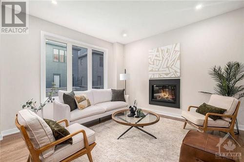 Living Room - 233 Conservancy Drive, Ottawa, ON - Indoor Photo Showing Living Room With Fireplace