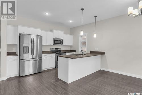 122 315 Dickson Crescent, Saskatoon, SK - Indoor Photo Showing Kitchen With Upgraded Kitchen