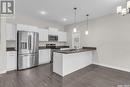 122 315 Dickson Crescent, Saskatoon, SK  - Indoor Photo Showing Kitchen With Upgraded Kitchen 