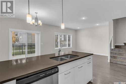 122 315 Dickson Crescent, Saskatoon, SK - Indoor Photo Showing Kitchen With Double Sink