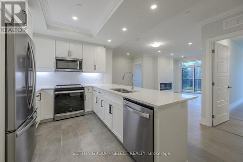 207 - 1975 Fountain Grass Drive, London, ON - Indoor Photo Showing Kitchen With Stainless Steel Kitchen With Double Sink With Upgraded Kitchen