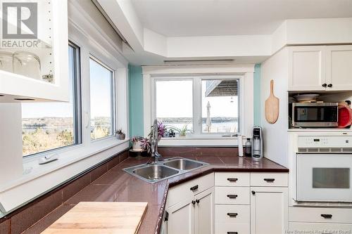 4 White Head Wharf Road, Clifton Royal, NB - Indoor Photo Showing Kitchen With Double Sink