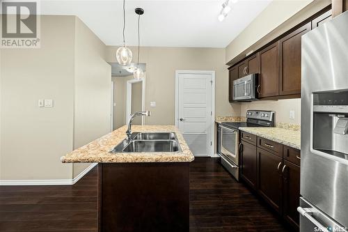 212 4501 Child Avenue, Regina, SK - Indoor Photo Showing Kitchen With Double Sink With Upgraded Kitchen