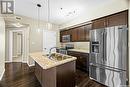 212 4501 Child Avenue, Regina, SK  - Indoor Photo Showing Kitchen With Stainless Steel Kitchen With Double Sink With Upgraded Kitchen 