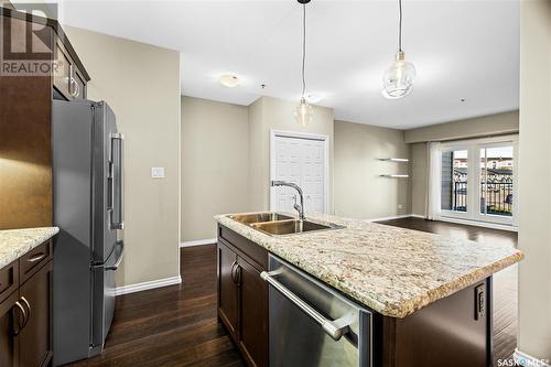 212 4501 Child Avenue, Regina, SK - Indoor Photo Showing Kitchen With Double Sink With Upgraded Kitchen