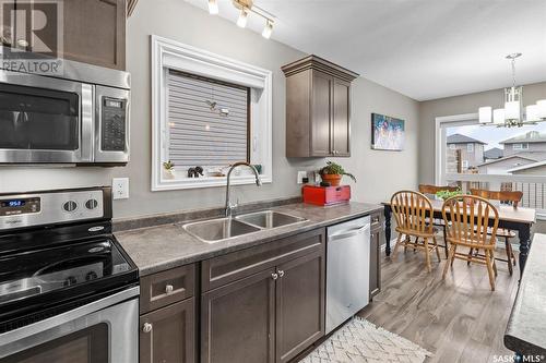 1058 Kloppenburg Bend, Saskatoon, SK - Indoor Photo Showing Kitchen With Stainless Steel Kitchen With Double Sink