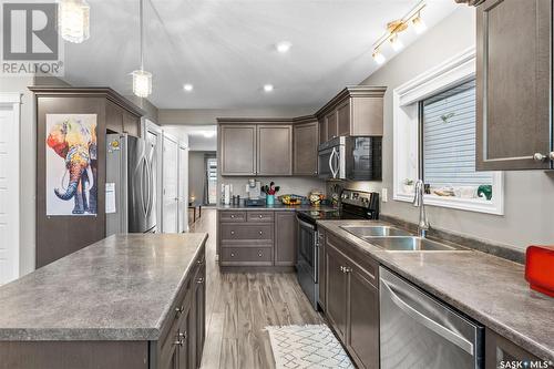 1058 Kloppenburg Bend, Saskatoon, SK - Indoor Photo Showing Kitchen With Double Sink