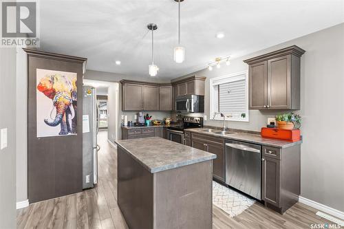 1058 Kloppenburg Bend, Saskatoon, SK - Indoor Photo Showing Kitchen With Stainless Steel Kitchen With Double Sink