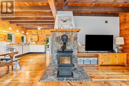 255 Main Street, Stone Mills, ON - Indoor Photo Showing Other Room With Fireplace