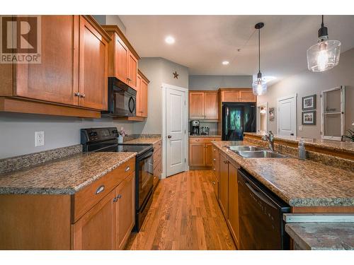 10634 Powley Court Unit# 205, Lake Country, BC - Indoor Photo Showing Kitchen With Double Sink