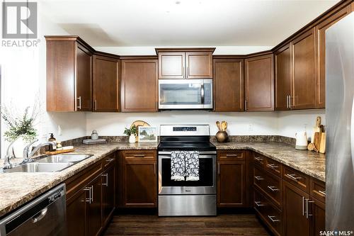 311 3630 Haughton Road E, Regina, SK - Indoor Photo Showing Kitchen With Double Sink