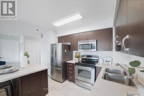 401 - 1600 Charles Street, Whitby (Port Whitby), ON - Indoor Photo Showing Kitchen With Double Sink