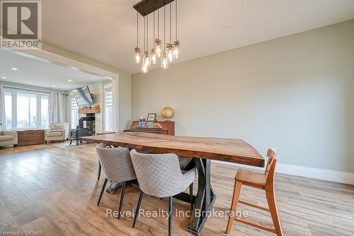 82 Sunview Drive, Norwich (Norwich Town), ON - Indoor Photo Showing Dining Room With Fireplace