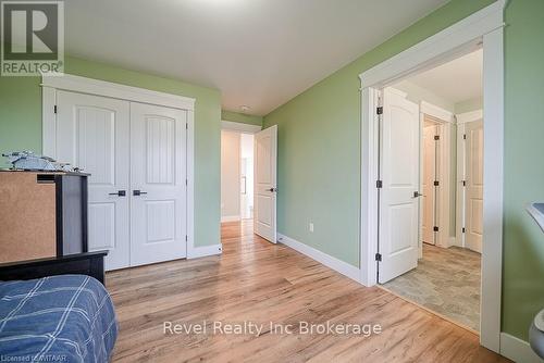 Office with a chandelier, a healthy amount of sunlight, and light hardwood / wood-style flooring - 82 Sunview Drive, Norwich, ON - Indoor