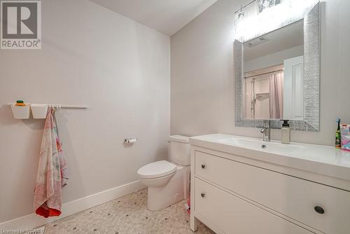 Bathroom with toilet and vanity - 82 Sunview Drive, Norwich, ON - Indoor Photo Showing Bathroom