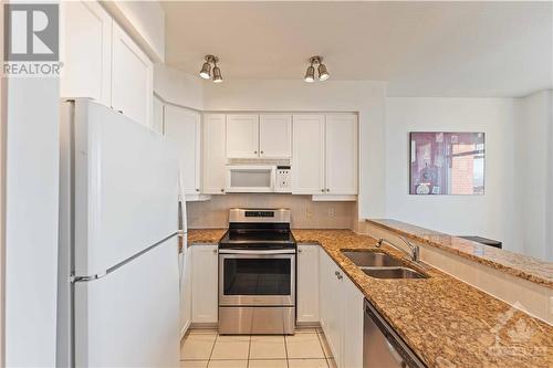 570 Laurier Avenue Unit#1802, Ottawa, ON - Indoor Photo Showing Kitchen With Double Sink