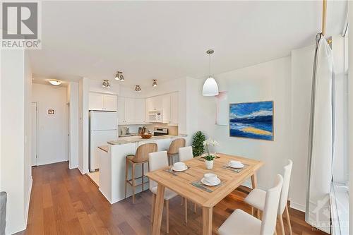 Dining room has been digitally staged to show effects - 570 Laurier Avenue Unit#1802, Ottawa, ON - Indoor Photo Showing Dining Room