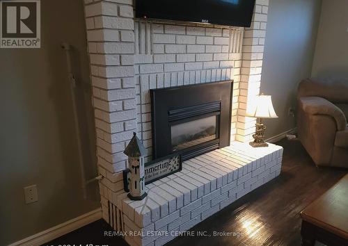 176 Coghill Place, Waterloo, ON - Indoor Photo Showing Living Room With Fireplace