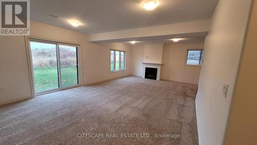 2551 9Th Avenue E, Owen Sound, ON - Indoor Photo Showing Other Room With Fireplace