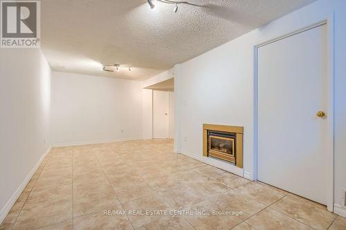 1 - 125 Sekura Crescent, Cambridge, ON - Indoor With Fireplace