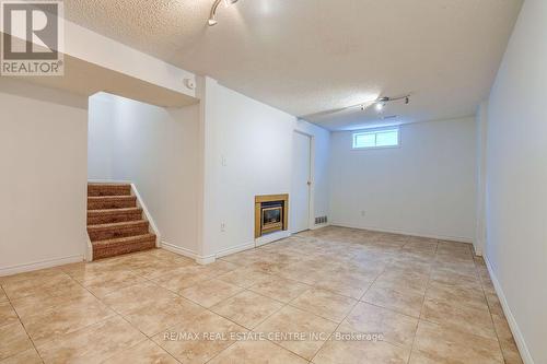 1 - 125 Sekura Crescent, Cambridge, ON - Indoor Photo Showing Other Room With Fireplace