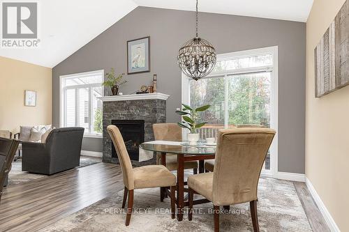 148 Pineridge Gate, Gravenhurst, ON - Indoor Photo Showing Dining Room With Fireplace