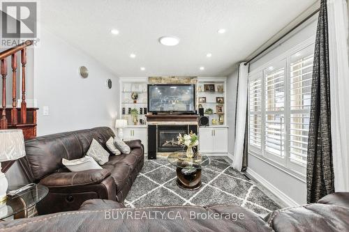 170 Southbrook Drive W, Hamilton, ON - Indoor Photo Showing Living Room With Fireplace