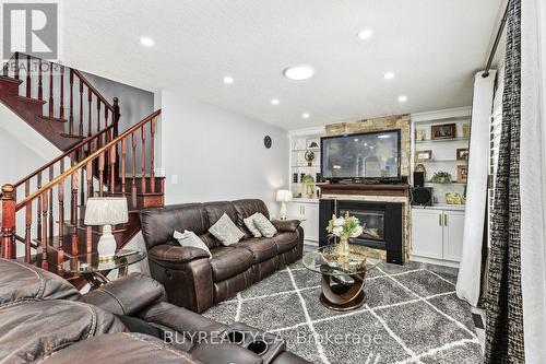 170 Southbrook Drive W, Hamilton, ON - Indoor Photo Showing Living Room With Fireplace