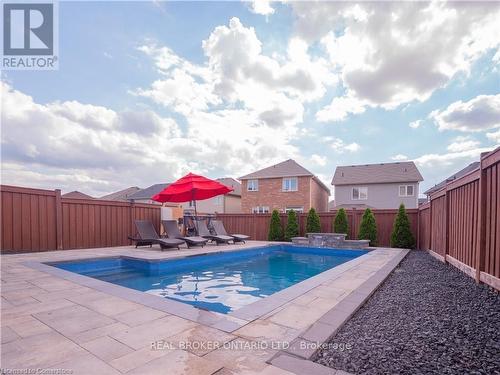 14 Carroll Lane, Brantford, ON - Outdoor With In Ground Pool