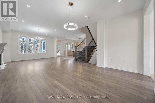 58 Stother Crescent, Bracebridge, ON - Indoor Photo Showing Other Room With Fireplace