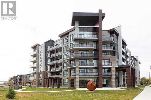 610 - 600 North Service Road, Hamilton, ON - Outdoor With Balcony With Facade